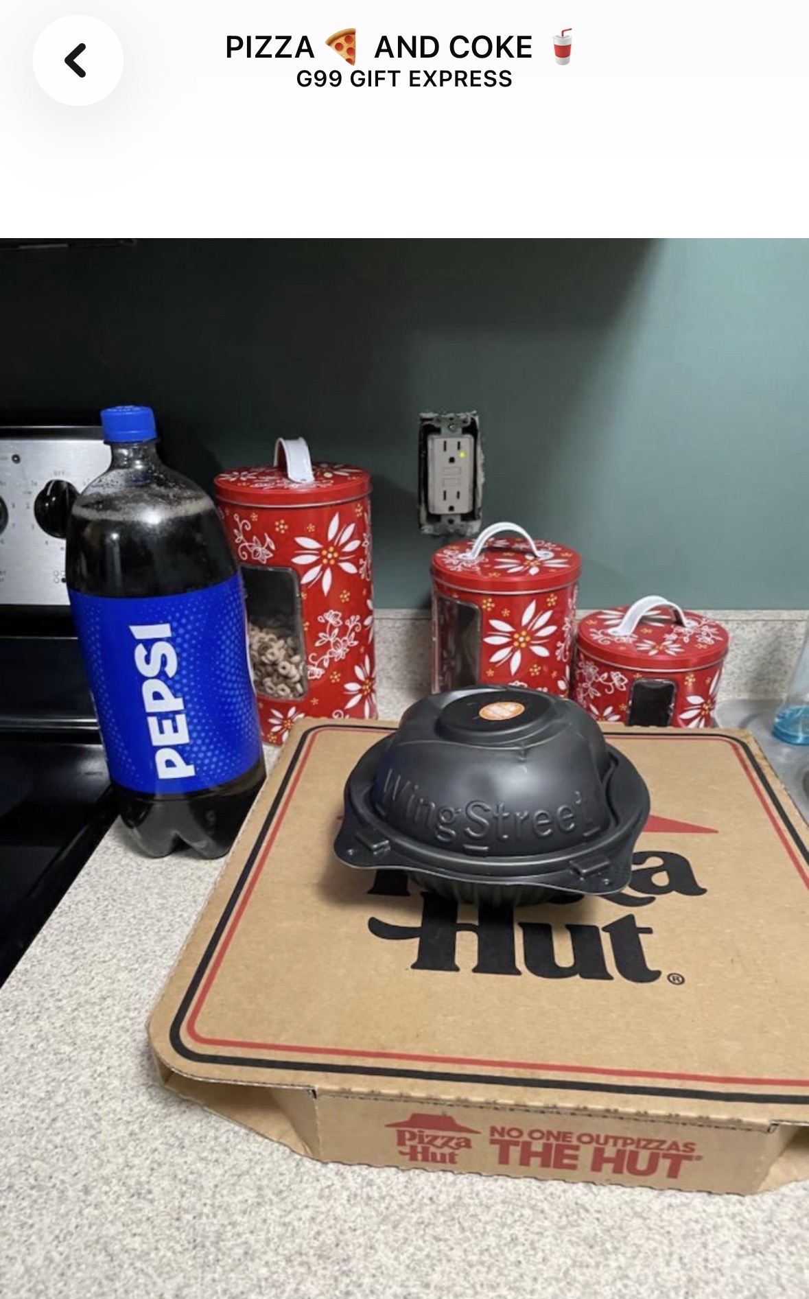 A pizza and a bottle of Pepsi sent as a treat